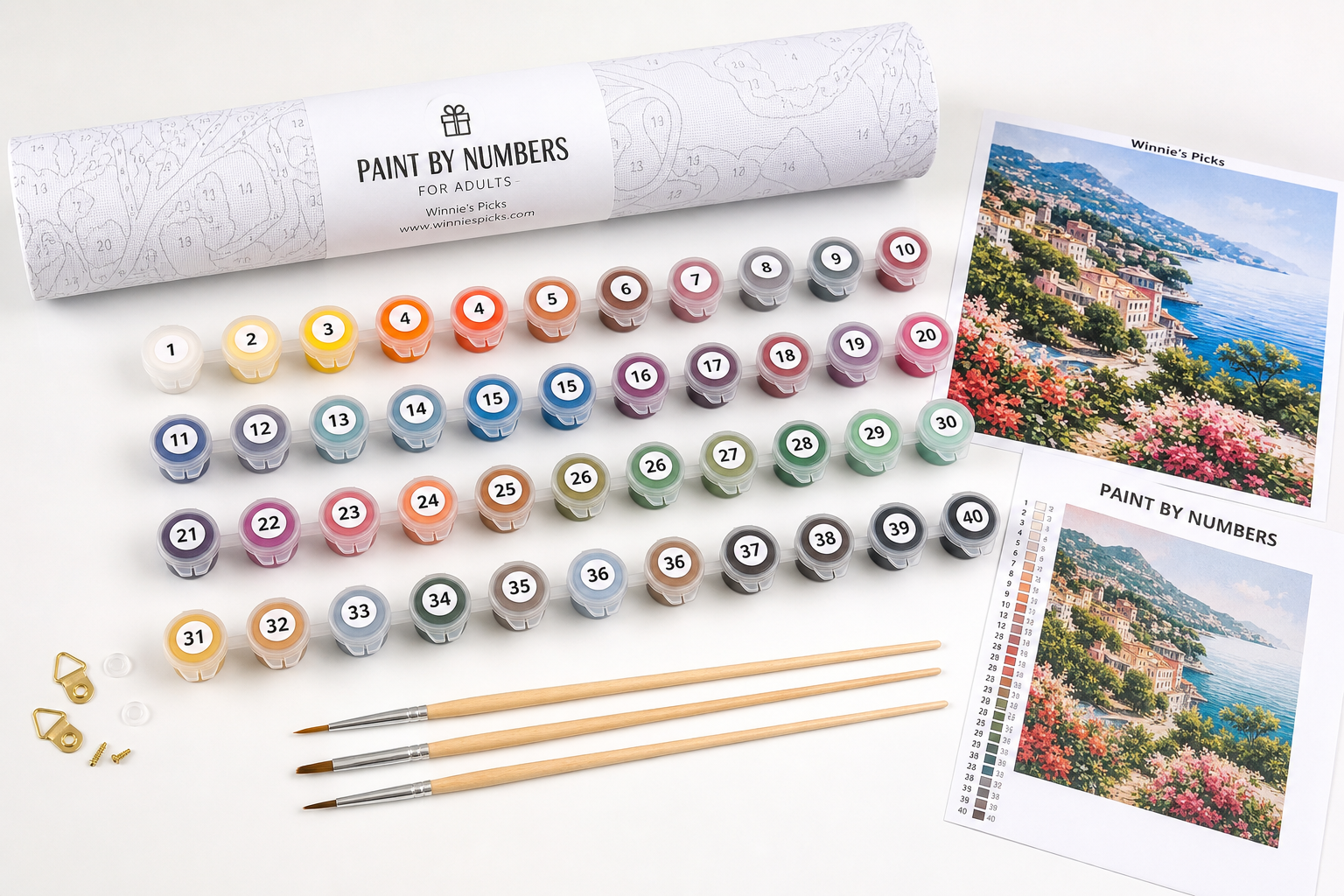 A complete paint by numbers kit laid out with canvas, paints, and brushes
